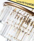 Close-up of 12 Light Gold Modern Crystal Chandelier Three Tier Pendant Lighting Fixture with K9 crystals detail.