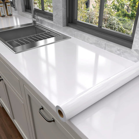 Glossy Glitter White Peel And Stick Contact Paper For Countertops Cabinets Backsplash And Tables Waterproof Vinyl Roll Easy To Clean 15.8 In By 118.1 In 12.89 Sq Ft Per Roll applied on kitchen countertop next to stainless steel sink