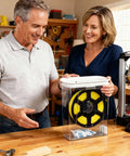 Couple using Moisture-Proof 3D Printing Filament Dryer Box with Built-In Desiccant, keeping PLA filament dry next to a 3D printer.