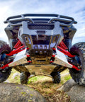 20 Piece UTV Skid Plate Bolts and Washers Kit for Polaris installed on vehicle in rocky terrain, showing underside protection.