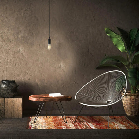 One Light Pendant With Matte Black Finish, Black Woven Fabric Cord, E26 Base Socket, Adjustable Hanging Length in cozy room