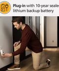 Person installing Smart Carbon Monoxide Detector And Indoor Air Quality Monitor 2 In 1 Plug In With WiFi Alexa Compatibility