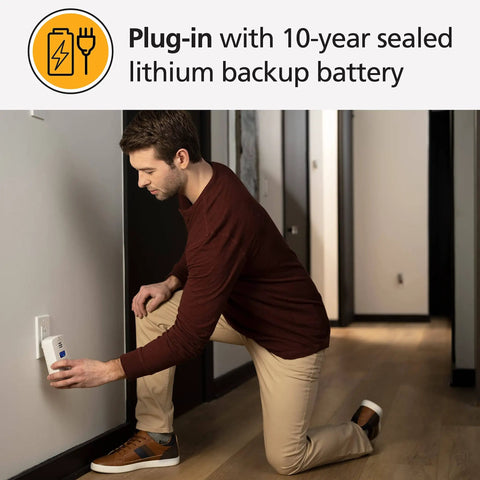 Person installing Smart Carbon Monoxide Detector And Indoor Air Quality Monitor 2 In 1 Plug In With WiFi Alexa Compatibility