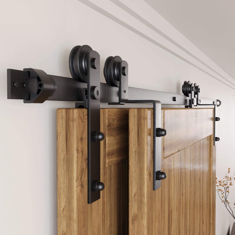 Black Rustic Single Track Bypass Sliding Barn Door Hardware Kit For Two Doors, 9ft Flat Track With Straight Rollers installed.