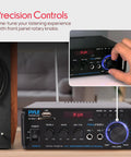 Compact 200W Bluetooth Power Amplifier For A 2 Channel Home Stereo Setup With Karaoke Ready Dual Mic Input RCA USB A And SD Card MP3 Player FM Radio AUX In And Remote Control, front panel view showing control knobs and display.