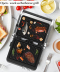 4 Slice Panini Press Contact Grill With Removable Non Stick Coated Plates Temperature Control Timer And Open 180 Degree Design For Cooking Sandwiches Steaks Sausages Quesadillas Half Black Stainless Steel Finish cooking seafood and steak on open grill