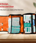 Interior of 380 Piece Deluxe First Aid Kit With Bandages Gauze Rolls Instant Cold Packs And Emergency Blanket Compact Orange Kit For Home Travel Camping And Car Ready For Grab And Go Everyday Care