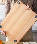 Person holding cutting board with Eight Pack Non Slip Rubber Feet Bumpers Kit With Screws And Stainless Washers