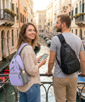 Man wearing Men's Sling Bag Crossbody Backpack, Compact Yet Roomy Small Sling Pack For Everyday Carry, Anti Theft Daypack For Travel And Hiking.