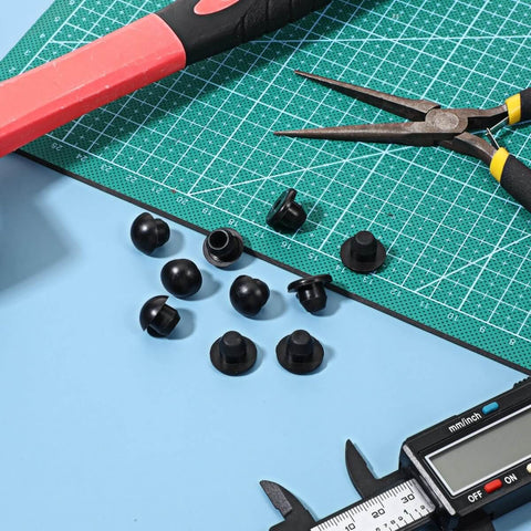 12 Piece Bottle Jack Rubber Plugs For Floor And Hydraulic Jacks Oil Filler Replacement Plugs on green cutting mat with tools