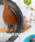 Pro Grade Teak Wood Cooking Spoons Set With Heavy Grip in nonstick pot with rice, surrounded by sliced vegetables and fruits