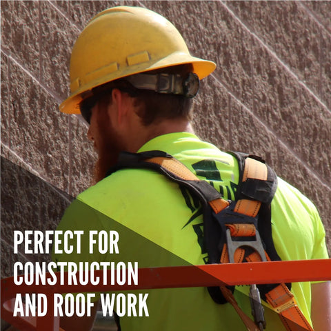 Worker using Warthog Tongue And Buckle Full Body Fall Protection Harness With X Pad, ANSI Z359.11 Compliance on a construction site