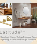Latitude II Euro Style Single Post Toilet Paper Holder In Brushed Brass For Modern Bathrooms Durable Metal Construction With Clean Lines Coordinates With Full Bath Accessory Collection shown in serene bathroom setting.