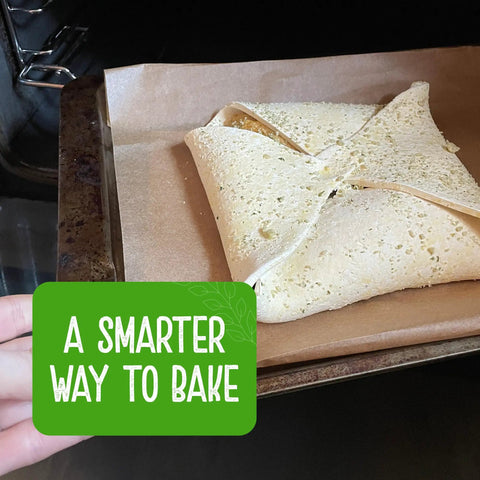 Baking bread wrapped on a tray using Compostable Unbleached Parchment Paper 60m Total Nonstick Greaseproof Baking Paper in oven
