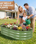 Family using Galvanized Raised Garden Bed Kit For Outdoor Use 4x2x1 Feet Durable Metal Planter Box For Vegetables And Flowers With Tools Included No Hassle Setup Green Finish