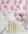 Bold Pink Pineapple Peel And Stick Wallpaper With Watercolor Pineapple Pattern decorating a bedroom wall, 17.7 in by 354 in vinyl roll