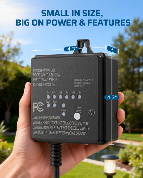 Hand holding Outdoor Low Voltage Transformer 60W 120V AC To 12V DC With Dusk To Dawn Sensor for LED landscape lighting in backyard.