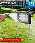 Outdoor Solar Bug Zapper 4500V Electric Mosquito Killer IP66 Waterproof Cordless With Type C Rechargeable Battery being cleaned