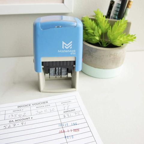 No Mess Self Inking Custom Stamp Kit With Dual Shade Blue And Red Ink Pads, on a desk with an invoice and green plant.
