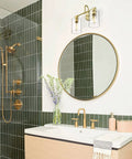 Bathroom with Brushed Nickel 3-Light Vanity Light With Clear Glass Shade above round mirror, modern wall fixture for hallways