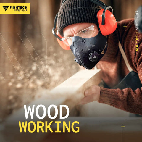 Person wearing Two Pack Dust Mask Kit With Ten Activated Carbon Filters And Two Extra Valves for woodworking comfort.