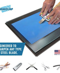 Person sharpening a blade on a PSA Lapping Film Pack Workhorse Seven Sheets 8.5 x 11 Inches Microfinishing Sanding Paper With Pressure Sensitive Adhesive Aluminum Oxide AO For Scary Sharp Sharpening System Waterproof Washable USA Made Polishing Paper.