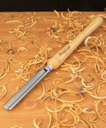 Heavy Duty High Speed Steel Spindle Roughing Gouge Set Delivers Slick Cuts with Rock Solid Beech Handle on Wood Shavings.