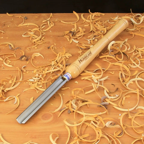 Heavy Duty High Speed Steel Spindle Roughing Gouge Set Delivers Slick Cuts with Rock Solid Beech Handle on Wood Shavings.