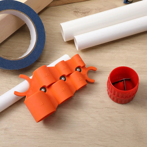 Depth And Diameter Gauge Tool For Pipe Fittings Push To Connect Deburring And Removal Tool with six orange fittings on table