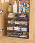 Clear Acrylic Stackable Makeup Organizer With Drawer, 4-tier unit with hair products and skin care, sleek design for organized storage.