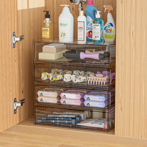Clear Acrylic Stackable Makeup Organizer With Drawer, 4-tier unit with hair products and skin care, sleek design for organized storage.