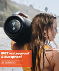 Woman carrying Boombox 3 Portable Bluetooth Speaker With Massive Sound And Deep Bass IPX7 Waterproof 24 Hour Playtime PartyBoost.