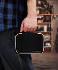 Person holding Hard Case Bundle With Magnetic Hanging Strap For Fluke Digital Multimeters 113 114 115 116 117