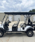 High Capacity Six Passenger Electric Golf Cart Featuring Rear Flip Seats Quiet Motor Drive Plush Padded Upholstery And Built In Armrests side view with gray seats.