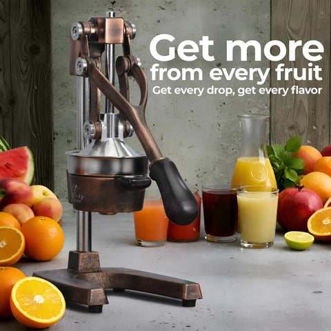 Heavy Duty Cast Iron Citrus Juicer Press with detachable strainer squeezing fresh juice from oranges and limes.