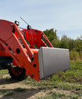 Five Sixteenth Inch Skid Steer Mount Plate Quick Attach Loader Plate on Kubota Tractor in a field