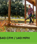 No Hassle 60V Cordless String Trimmer And 540 CFM Air Blower Yard Work Combo Set with 540 CFM air blower in action clearing leaves.