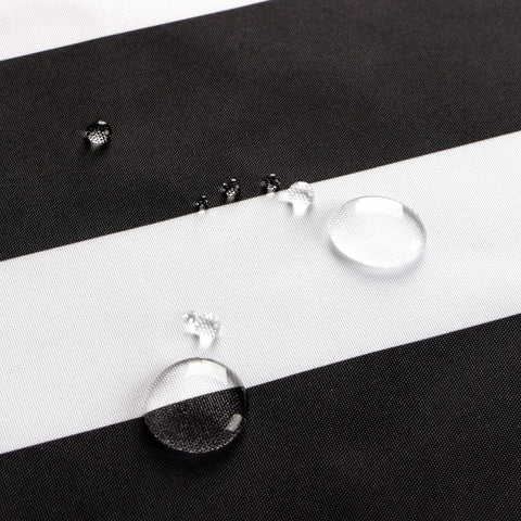 Close-up of water droplets on Outdoor Round Tablecloth 60 Inch With Zipper Umbrella Hole Water Resistant Polyester Durable Patio Garden Table Cover