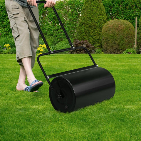 Person using Lawn Roller Heavy Duty For Seedbed Prep, No Fuss Push Or Tow Behind Sod Roller With U Shaped Handle, Water Or Sand Filled Drum, 19.5 Inch Garden Roller For Lawn, Backyard And Garden Care, Black