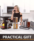 Woman using Bartesian with 48 Pod Capsule Holder Carousel, 360 Degree Chrome Tower Stand, and cocktail glasses on counter