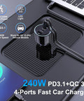 Ride Ready Hella Fast 240W Type C Car Charger Featuring 4 PD 3.1 140W And PD 3.0 100W Ports For Macbook Pro iPhone 16 Samsung Galaxy S24 Chromebook on a desk with a smartphone.