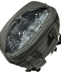 Insulated Cooler Backpack For 4 With Plates And Glasses Lightweight Lunch Pack Featuring Hardwood Serving Board Cheese Knife Corkscrew 30 Can Capacity Leak Proof Picnic Setup showing clear glasses inside the cooler compartment.
