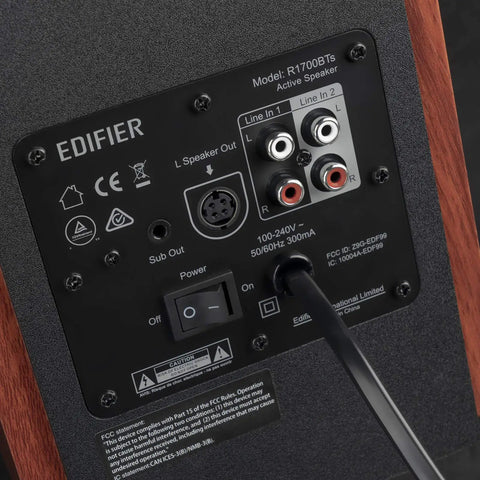 Back panel view of R1700BTs Wireless Bluetooth Bookshelf Speakers With AptX HD And Sub Output, showing input options and connections.