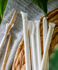 Agave Fiber Straws 1000 Count Individually Wrapped 8.2 Inch Biodegradable Eco Friendly Plant Based Reusable Alternative To Paper And Plastic Straws For Everyday Kitchen And Bar Use, wrapped straws on woven tray