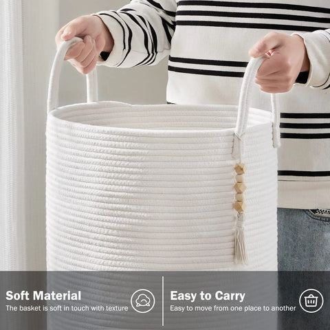 Person holding a Cotton Rope Laundry Hamper Basket 58L Tall Woven Collapsible Organizer for Blankets Clothes Toys in Laundry Room