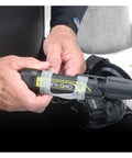 Hands holding MiniQ40 MK2 Dive Light 250 Lumens Hand Free Underwater Torch With Mask Strap 5 Hour Run Time Push Button Rear Switch