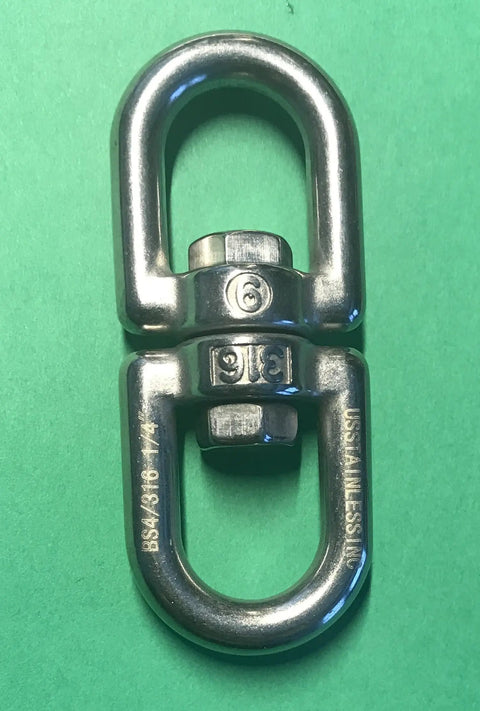 Top Shelf Marine Grade 316 Stainless Steel Anchor Swivel Eye And Eye 6mm 1/4 Inch heavy-duty rigging hardware close-up on green background.