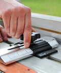Person using Pro Grade Thin Rip Table Saw Jig Guide for Router and Band Saw, durable tool for precise woodworking cuts