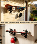 Heavy Duty Metal Snowboard Rack And Ski Wall Mount With Bottom Hooks To Stack Longboards And Skateboards Vertically Takes Zero Floor Space Built Tough For The Daily Shred displayed outdoors and indoors.