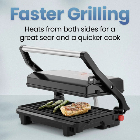 Chefman Indoor Grill Panini Press With Stainless Steel Finish And Nonstick Plates cooking chicken and asparagus on grill plates